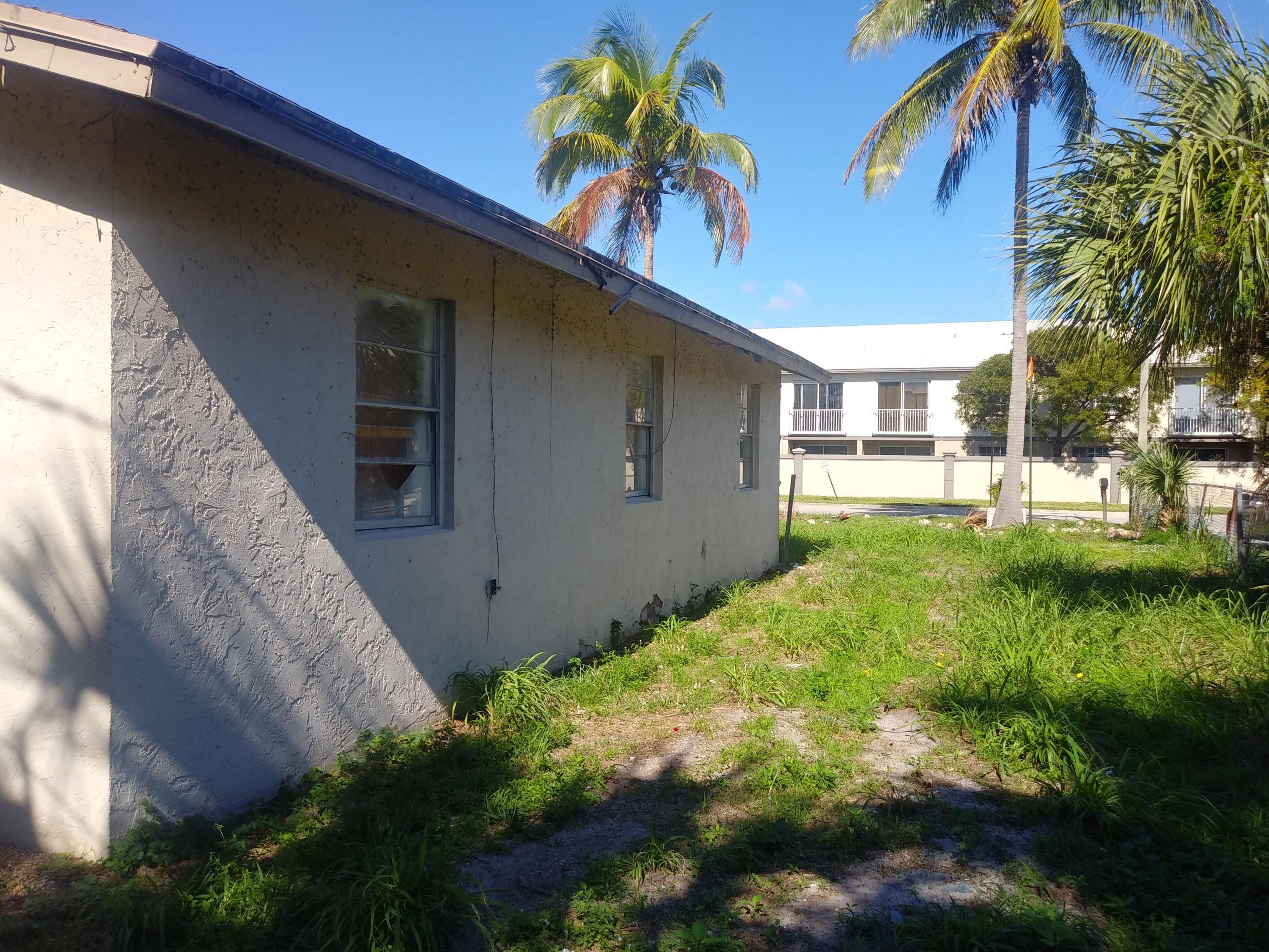 1971 West 13th Street Riviera Beach, FL 33404 - Photo 4 of 14 side view (1)