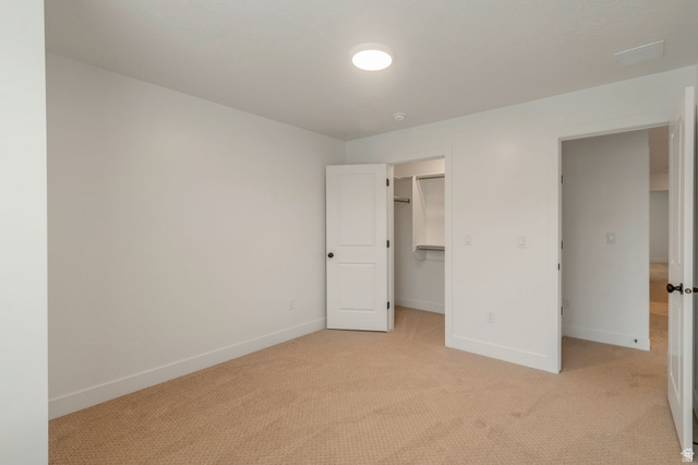 30 South Moonlit Road Mapleton, UT 84664 - Photo 18 of 25 Neutral-toned carpet flooring with white baseboards and walls