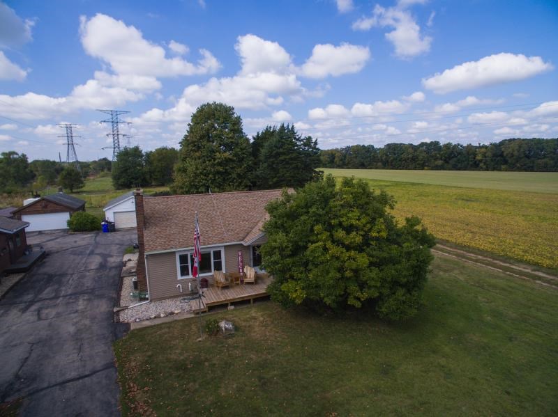 5123 River Road Cherry Valley, IL 61016 - Photo 14 of 15 an aerial view of a house with a garden