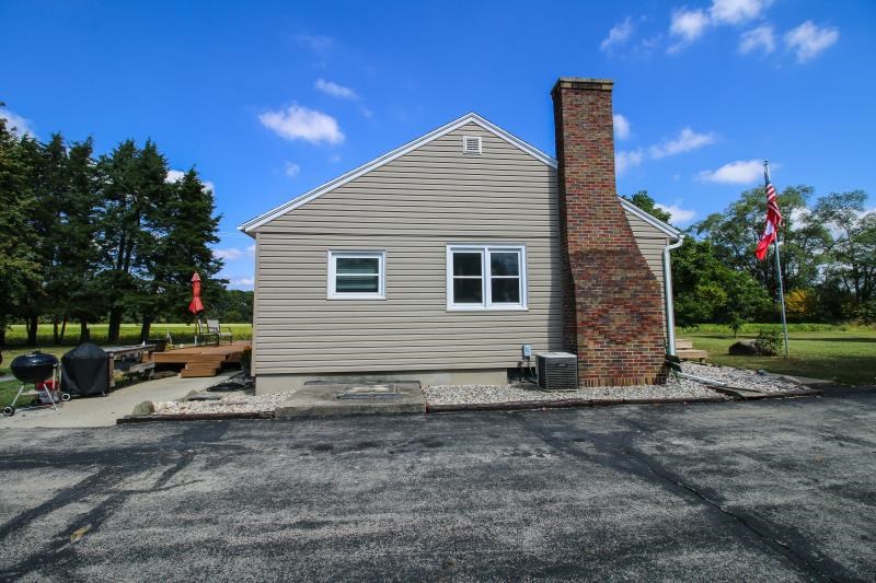 5123 River Road Cherry Valley, IL 61016 - Photo 9 of 15 a view of a house with backyard