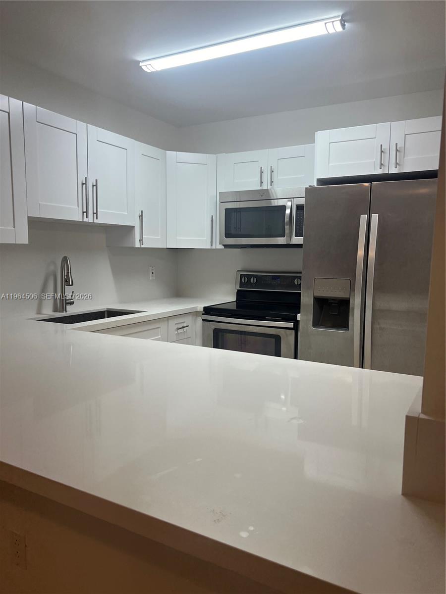 13820 Southwest 112th Street, Unit 108 Miami, FL 33186 - Photo 1 of 13