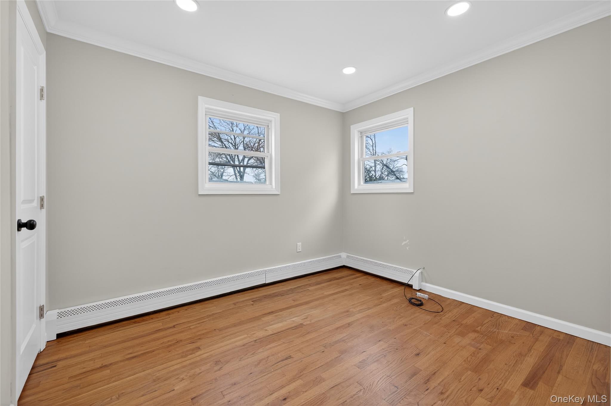15 Lindsay Street Huntington, NY 11743 - Photo 15 of 23 an empty room with a workbench