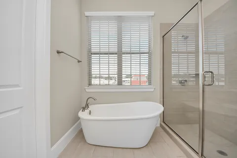 a bathroom with a sink vanity and a mirror