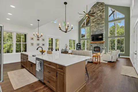 a view of living room with furniture and a flat screen tv