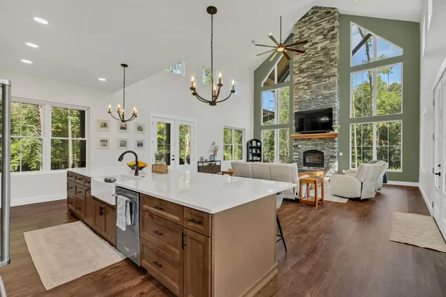 a view of living room with furniture and a flat screen tv