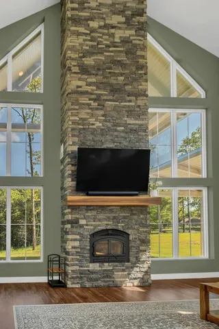 a living room with furniture and a table