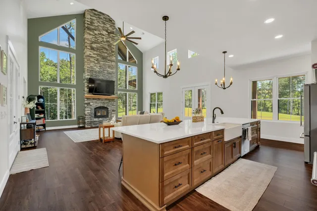 a kitchen with wooden cabinets and a stove top oven