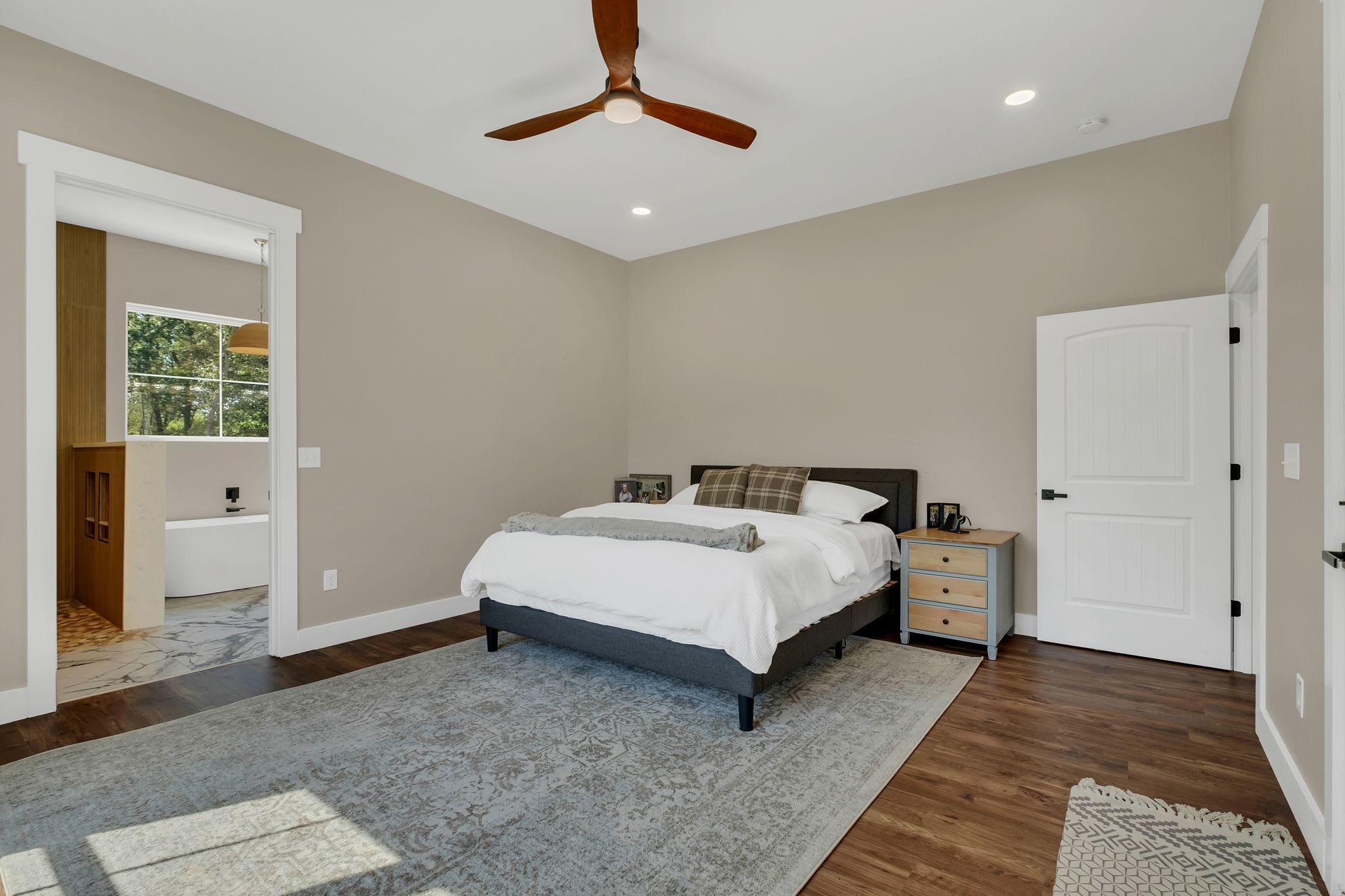 3573 Sandy Springs Road Cedar Hill, TN 37032 - Photo 25 of 87 a spacious bedroom with a bed and a rug