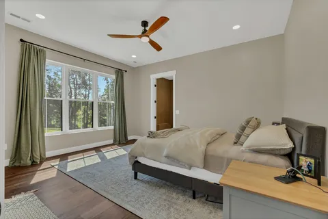 a bedroom with a bed and a closet