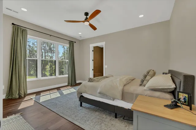 a bedroom with a bed and a closet