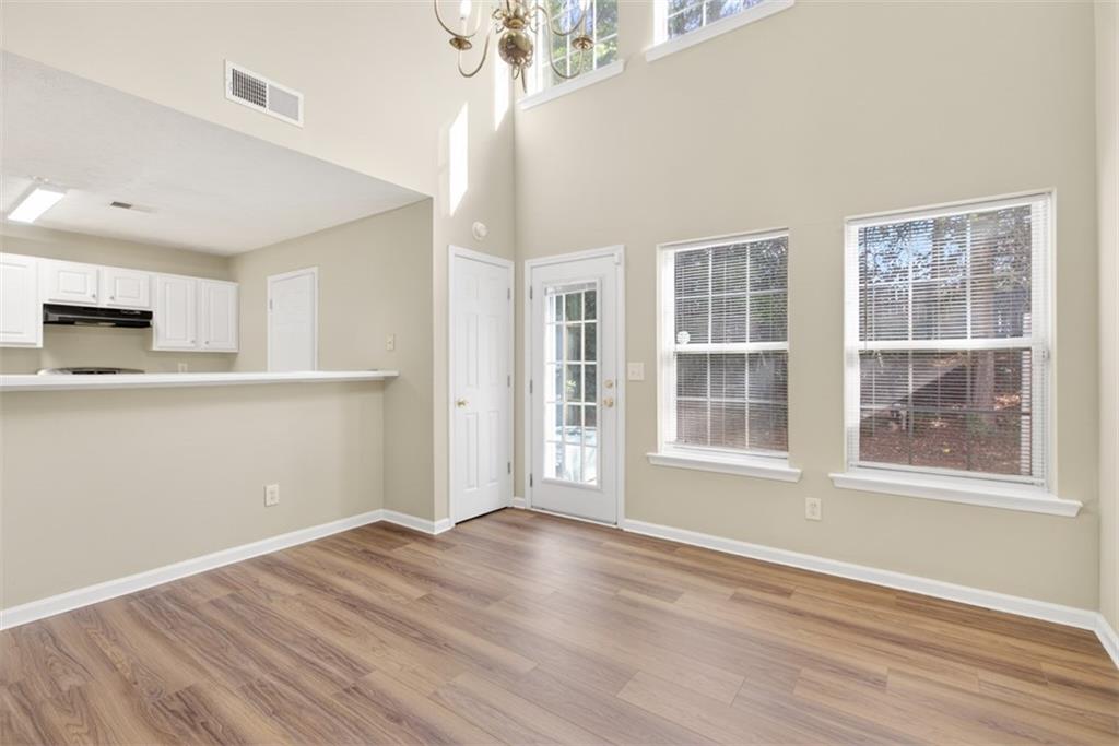 3159 Panthers Trace Decatur, GA 30034 - Photo 11 of 39 a view of a kitchen with wooden floor and a window