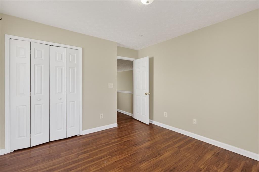 3159 Panthers Trace Decatur, GA 30034 - Photo 20 of 39 a view of an empty room with wooden floor