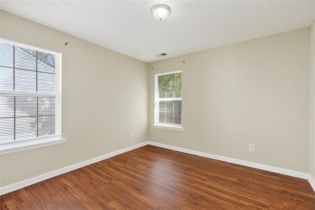 3159 Panthers Trace Decatur, GA 30034 - Photo 25 of 39 a view of a livingroom with wooden floor and window