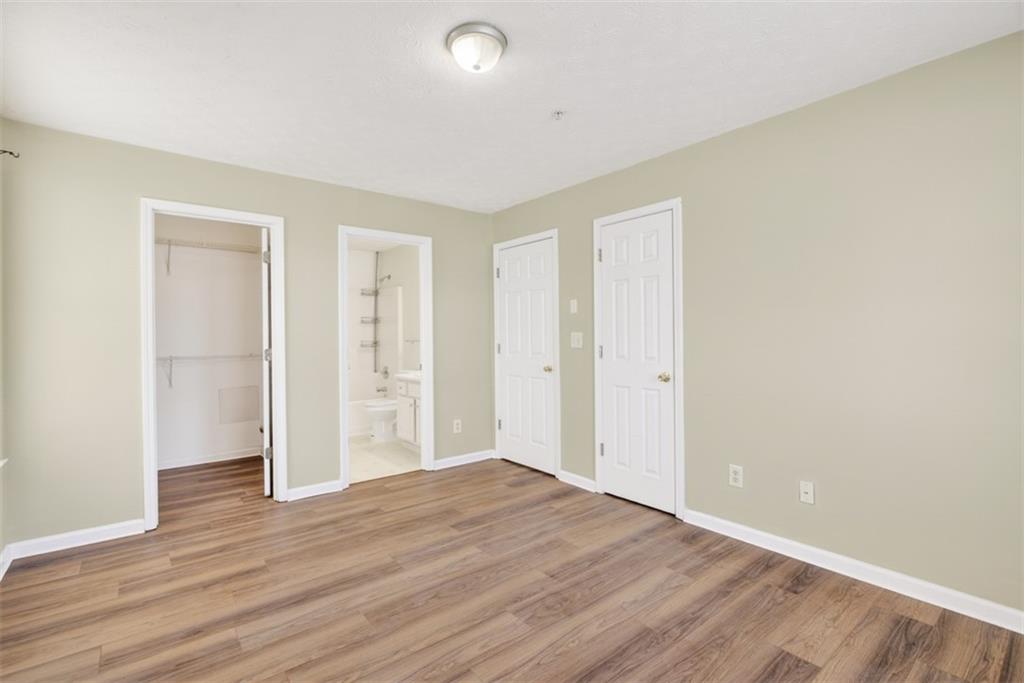 3159 Panthers Trace Decatur, GA 30034 - Photo 34 of 39 a view of an empty room with wooden floor