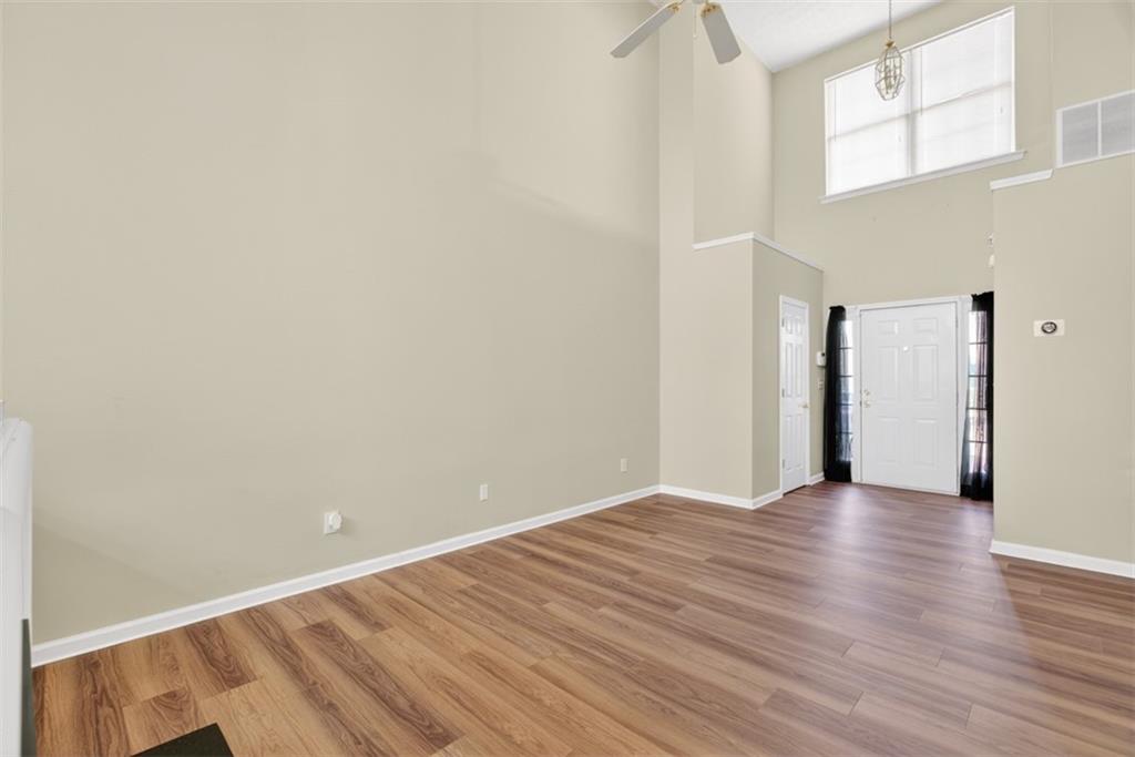 3159 Panthers Trace Decatur, GA 30034 - Photo 6 of 39 a view of an empty room with wooden floor