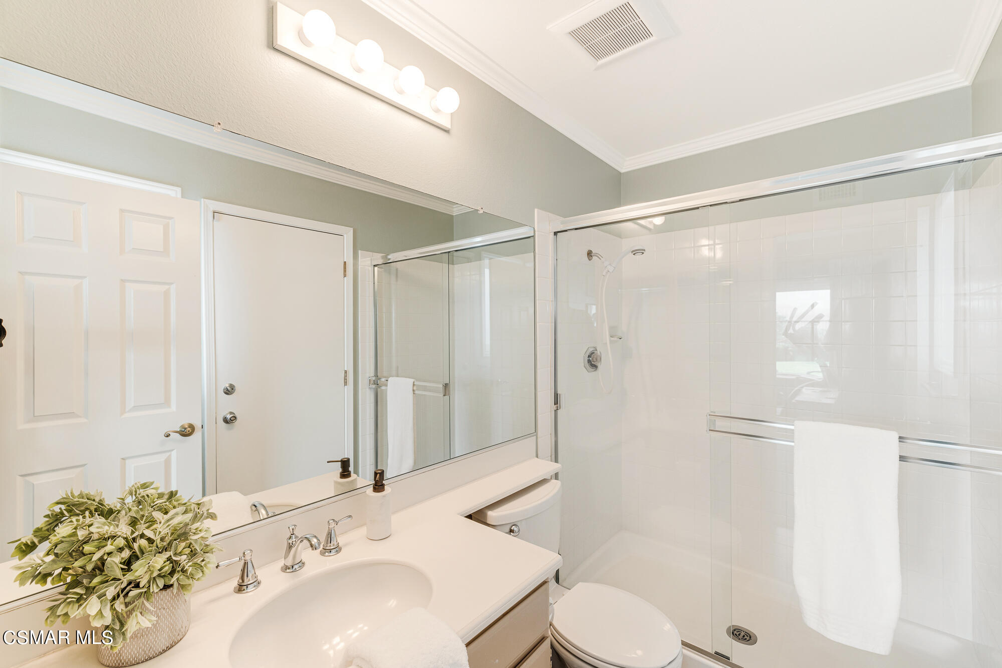 11553 Chestnut Ridge Street Moorpark, CA 93021 - Photo 20 of 68 a bathroom with a sink toilet and shower