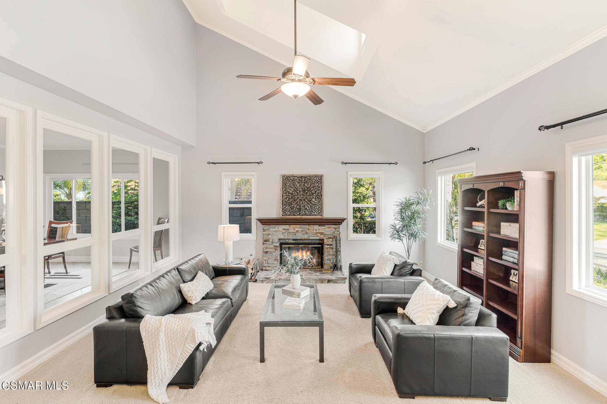 11553 Chestnut Ridge Street Moorpark, CA 93021 - Photo 6 of 68 a living room with furniture fireplace and a large window