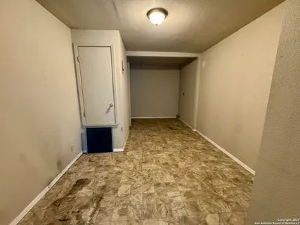 an empty room with an entrance