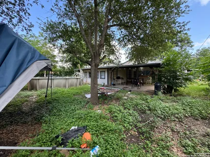 a backyard of a house with lots of green space