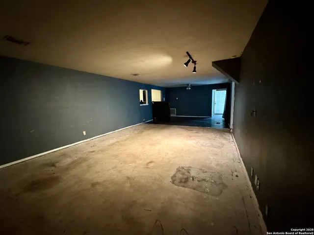a view of a livingroom with a staircase