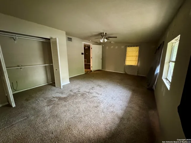 an empty room with windows