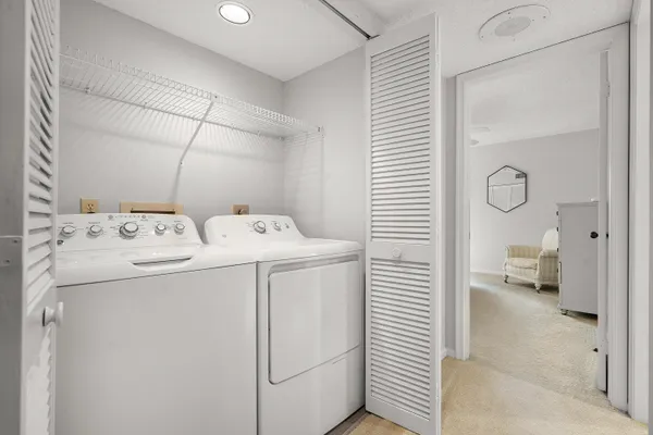a utility room with dryer and washer