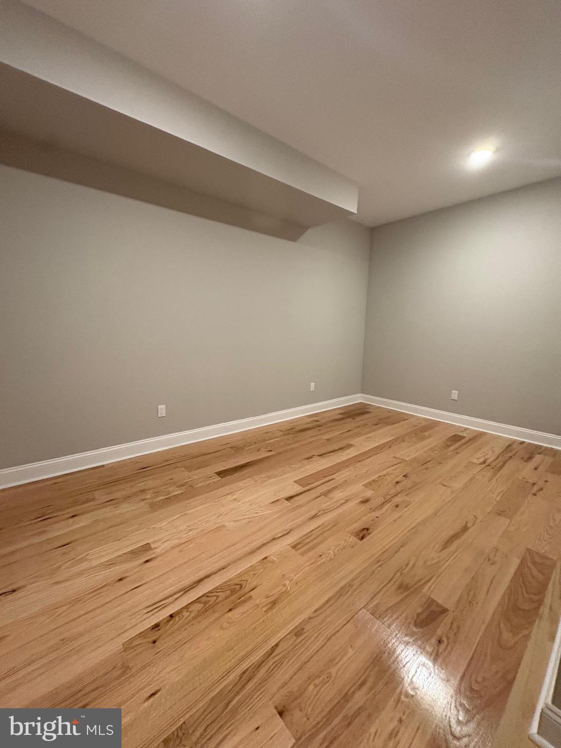 2900 North 5th Street, Unit 1 Philadelphia, PA 19133 - Photo 7 of 9 a view of room with wooden floor