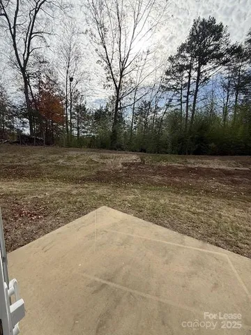 a view of a lake with trees