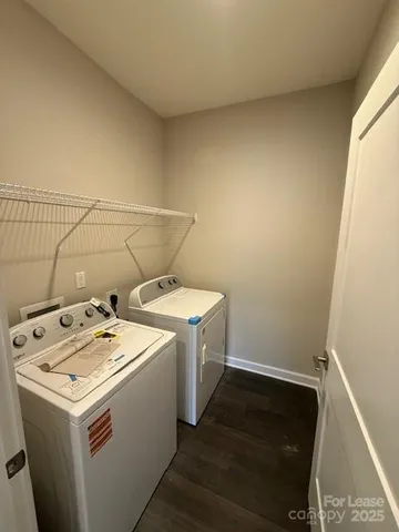 a view of an empty room with windows