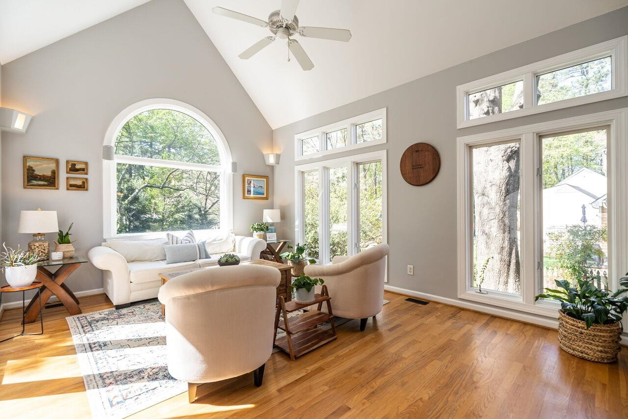 5905 Stable Court Raleigh, NC 27612 - Photo 12 of 30 a living room with furniture and a large window