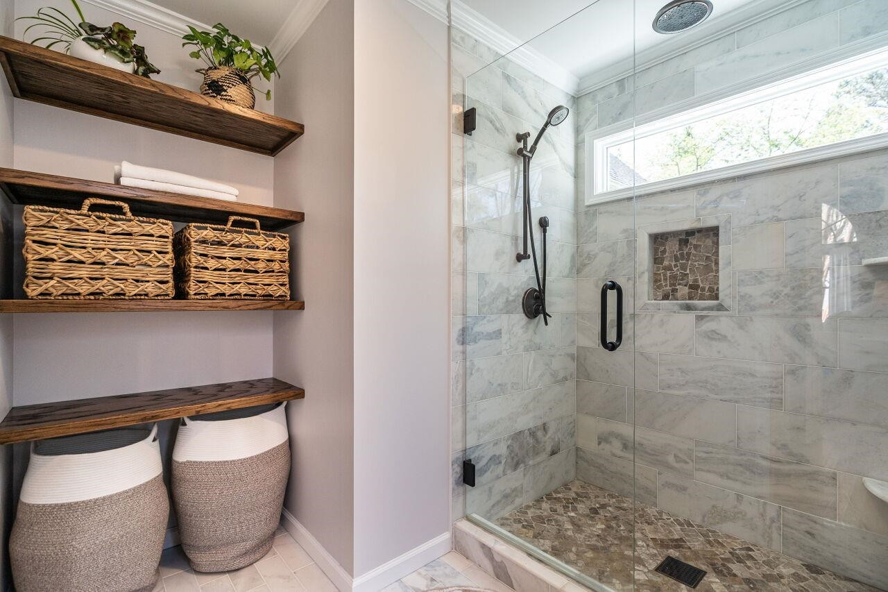 5905 Stable Court Raleigh, NC 27612 - Photo 17 of 30 a bathroom with a shower