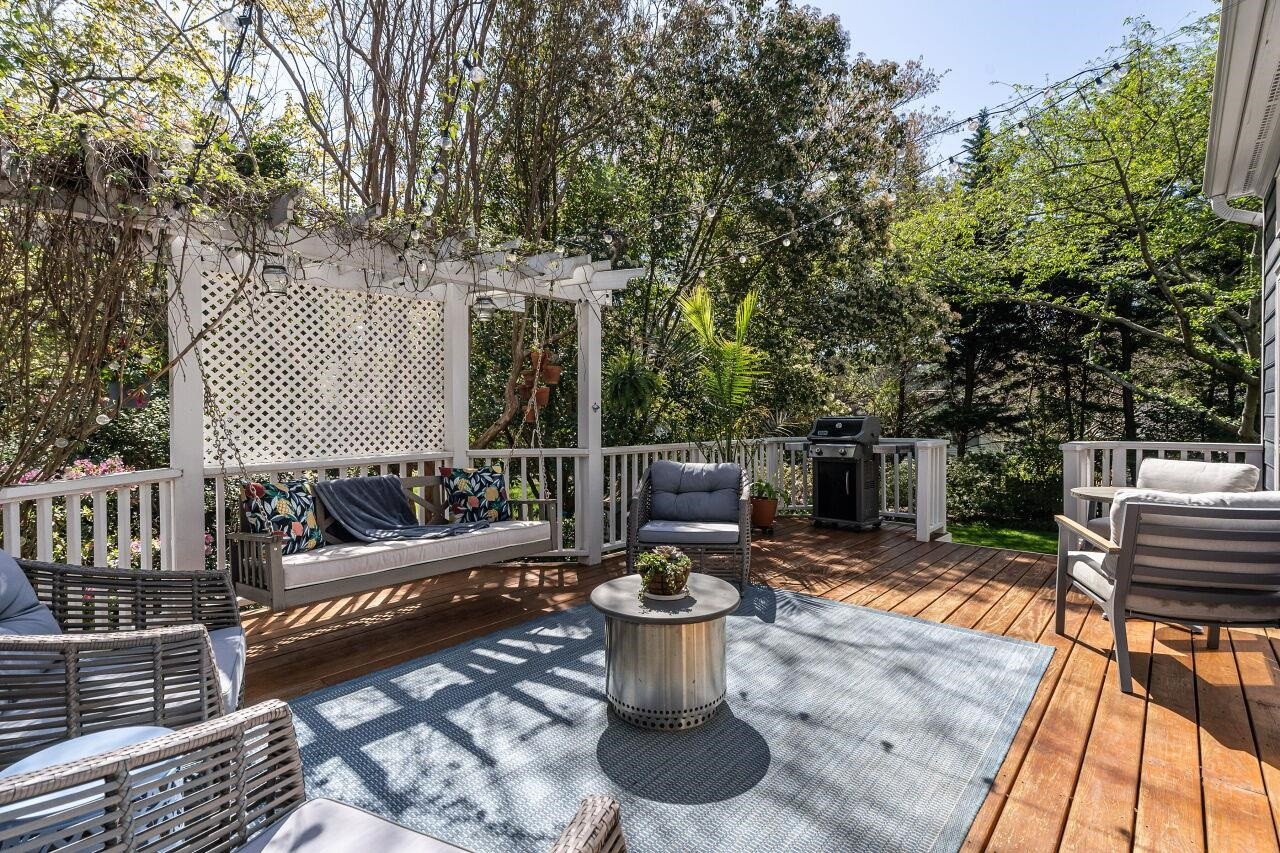 5905 Stable Court Raleigh, NC 27612 - Photo 24 of 30 a view of a deck with couches table and chairs