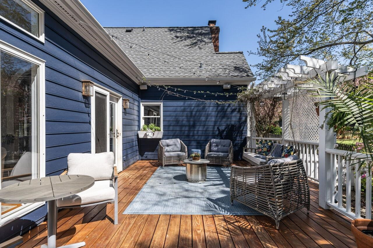 5905 Stable Court Raleigh, NC 27612 - Photo 25 of 30 a view of a patio with couches table and chairs and potted plants