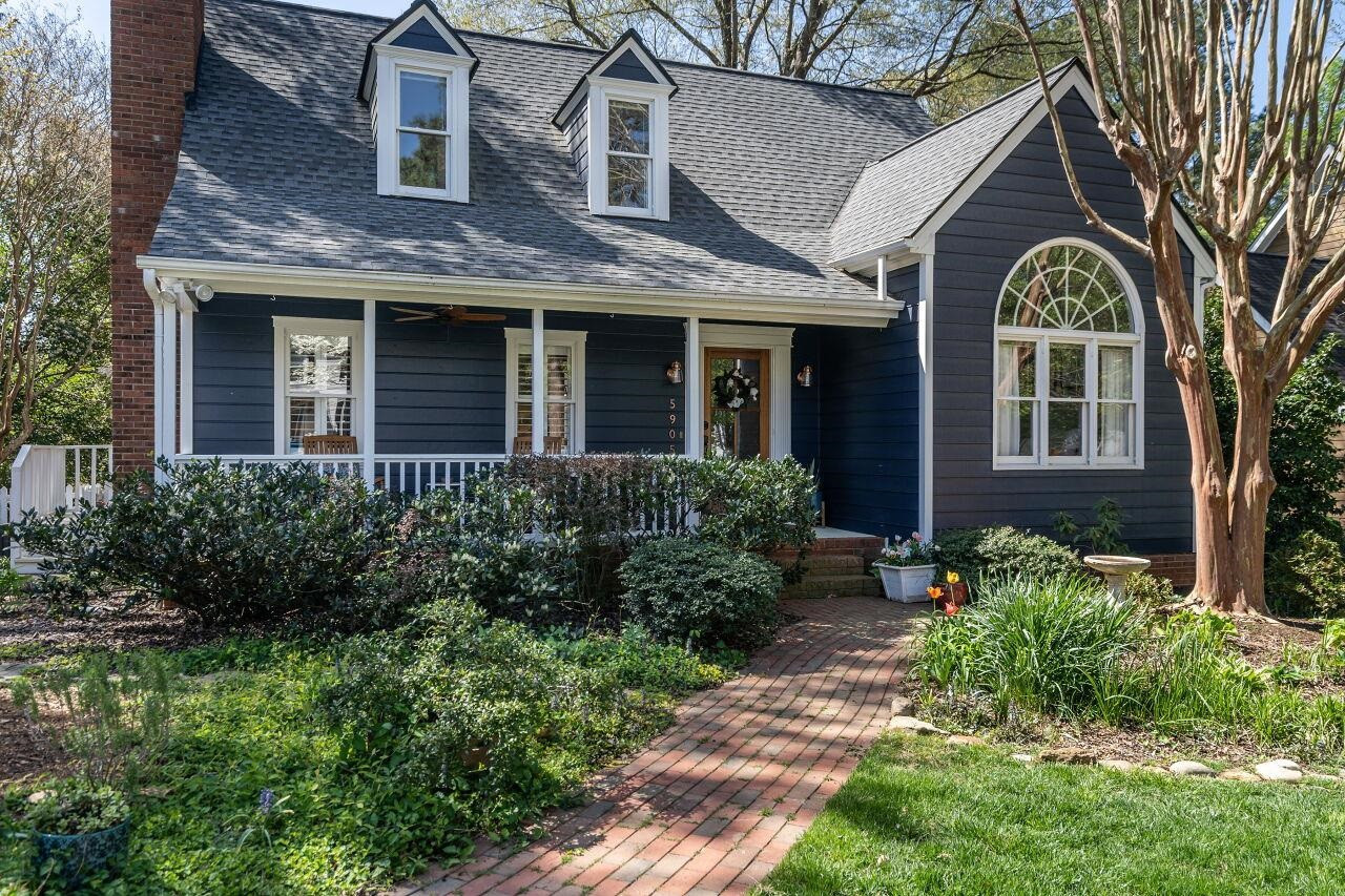 5905 Stable Court Raleigh, NC 27612 - Photo 30 of 30 a front view of a house with garden