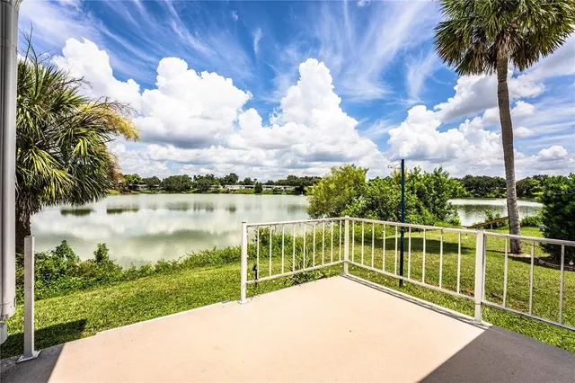 a view of a lake from a balcony