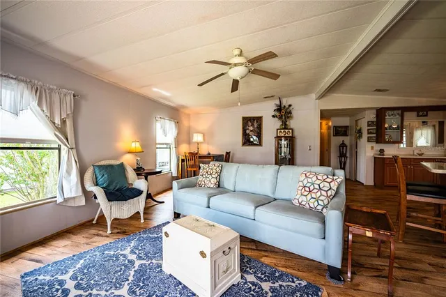 a bed room with a bed and a chandelier