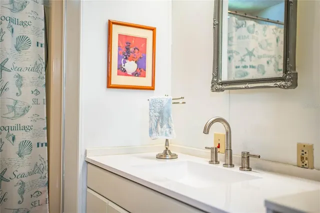 a bed room with a bed and furniture