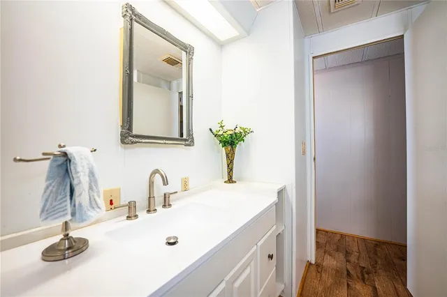 an aerial view of a house with a lake view