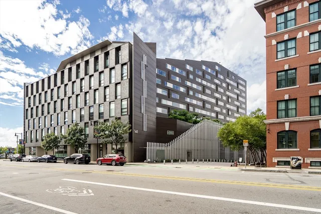 a view of a building and a street