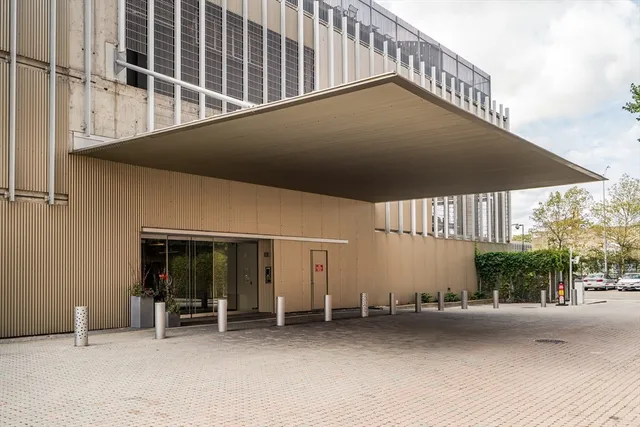 a view of a house with backyard and porch