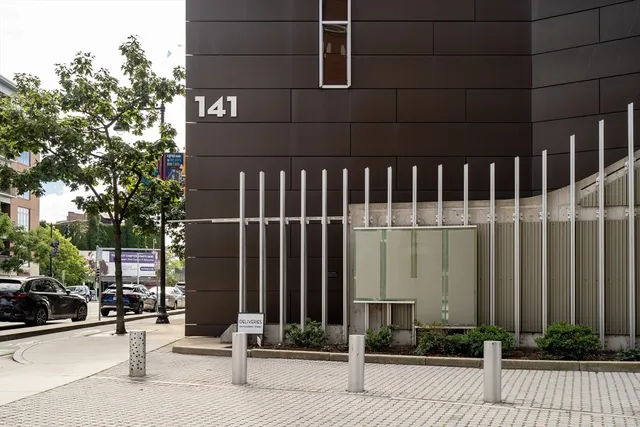 a view of a building with sitting area