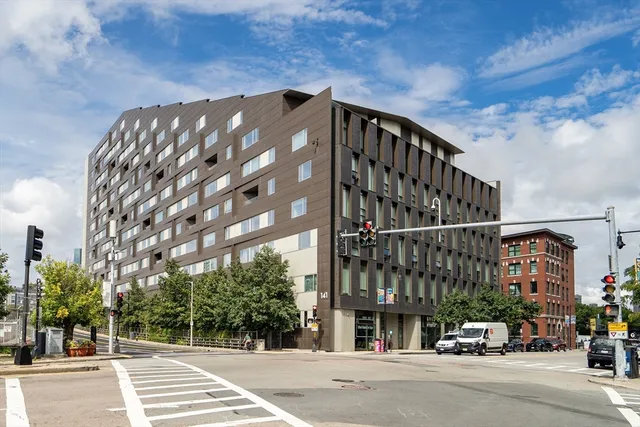 a view of a building with a street