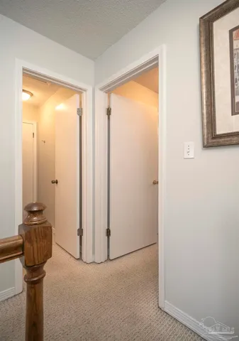 a view of a livingroom with an empty space and a window