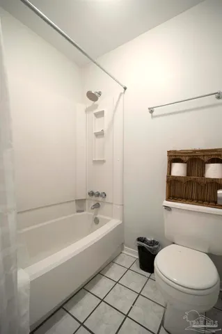 a bathroom with a toilet a sink and bathtub