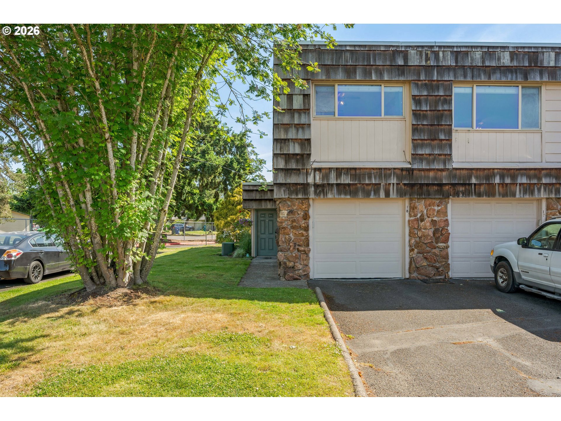 2727 Gateway Street, Unit 18 Springfield, OR 97477 - Photo 2 of 34 a house view with a garden space