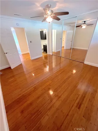 en view of empty room with a fireplace