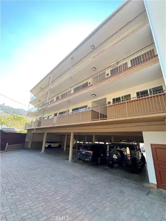 a view of swimming pool with seating space