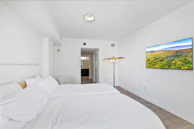 a bathroom with a bathtub and a sink