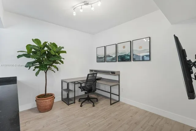 a close view of a utility room with washer and dryer