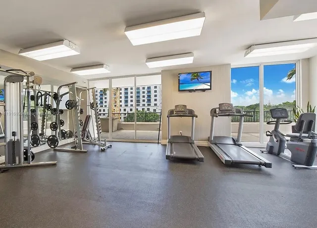 a view of a room with gym equipment